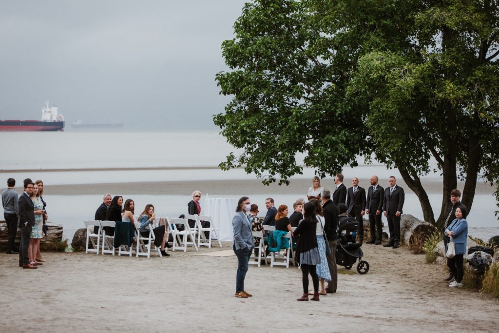 Wide angle view of the ceremony with the guests waiting for the bride to walk down the aisle