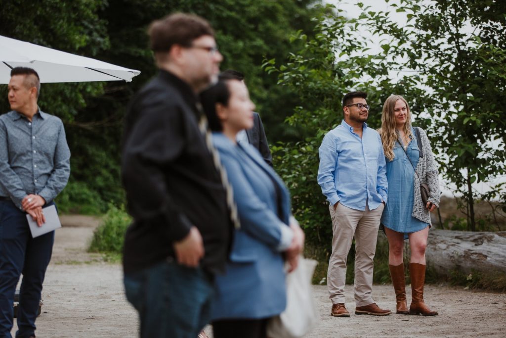 candid photos of the guests attending the ceremony in Spanish Banks