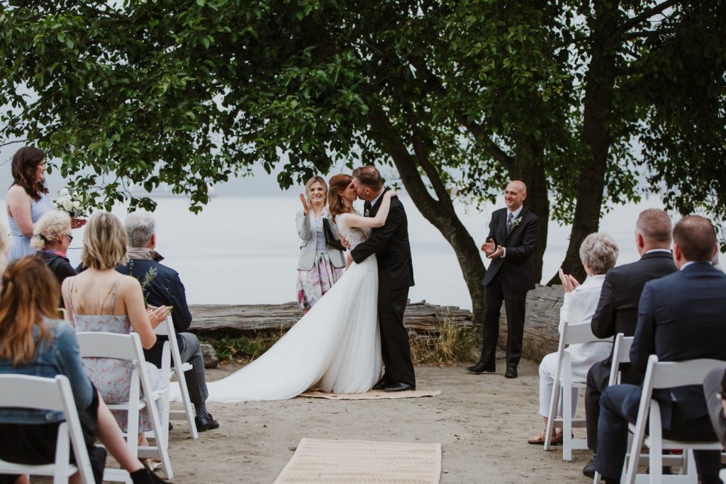 Bride and groom kiss after being announced at husband and wife