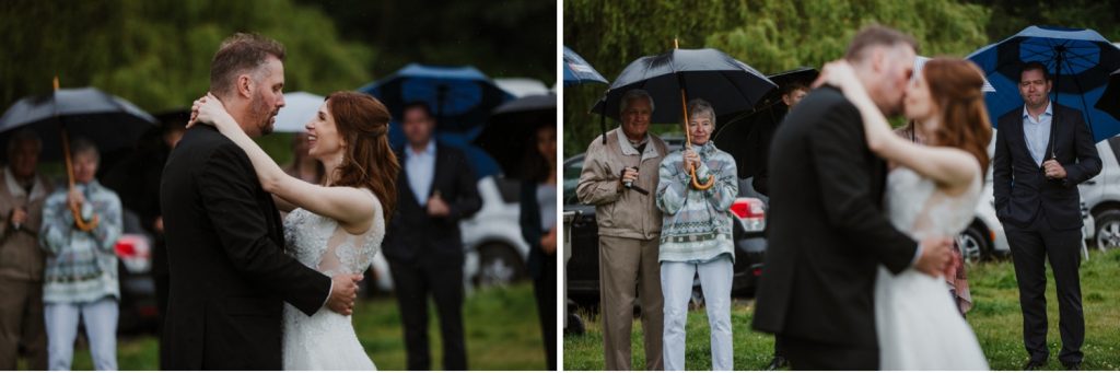 Bride and groom first dance under the rain in spanish banks